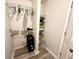 Walk-in closet with wire shelving and hanging storage for organized wardrobe at 4079 Woodridge Way, Tucker, GA 30084