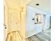 View of the hallway with wood floors and white walls at 4079 Woodridge Way, Tucker, GA 30084