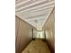 Apartment hallway with painted walls, overhead lighting, and stair access at 4079 Woodridge Way, Tucker, GA 30084