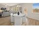 Open concept living area with a dining table, connecting to a spacious Gathering room at 2712 Sw Riverpine Lot 175 Sw Trl, Atlanta, GA 30331