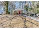 Charming single-story home with a red front door and cozy carport at 2720 Santa Barbara Nw Dr, Atlanta, GA 30318