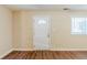 Inviting space with natural light highlighting the newly installed laminate floors at 2720 Santa Barbara Nw Dr, Atlanta, GA 30318