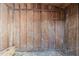 A shed with walls constructed from vertical wooden planks and a dirt floor at 2720 Santa Barbara Nw Dr, Atlanta, GA 30318