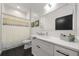 Modern bathroom with white vanity, hexagon floor tiles and shower at 260 18Th St # 10320, Atlanta, GA 30363