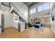 Open living area with high ceilings, modern furniture, and kitchen at 260 18Th St # 10320, Atlanta, GA 30363