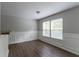 Elegant dining room with stylish wainscoting and wood floors at 804 Thomasville Se Blvd, Atlanta, GA 30315