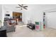 Bright living room featuring tile flooring, ceiling fan, and an open transition into the kitchen at , Decatur, GA 30032