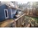 Outdoor deck area perfect for grilling and entertaining overlooking the backyard at 1620 Palm St, Canton, GA 30115