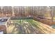 Expansive backyard enclosed by a tall fence, offering ample space for recreation at 1620 Palm St, Canton, GA 30115