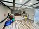 Finished basement with a recreational area featuring stylish flooring, seating, and playful accents at 1620 Palm St, Canton, GA 30115