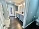 Bright bathroom features double sink, gray cabinets and stylish fixtures at 1620 Palm St, Canton, GA 30115