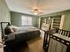 Bedroom with a large window, built-in shelves, and neutral colors at 1620 Palm St, Canton, GA 30115