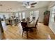 Spacious open floor plan with hardwood floors and a combined dining and kitchen area at 1620 Palm St, Canton, GA 30115
