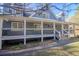 Gray house with wraparound porch and white railings at 1620 Palm St, Canton, GA 30115
