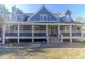 Charming home with a welcoming front porch and a well-maintained yard at 1620 Palm St, Canton, GA 30115