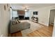 Comfortable living room with hardwood floors, a fireplace, and plenty of natural light at 1620 Palm St, Canton, GA 30115