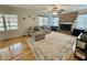 Bright and airy living room with hardwood floors, a fireplace, and stylish furniture at 1620 Palm St, Canton, GA 30115