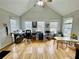 Bright office space with hardwood floors, vaulted ceiling, and multiple windows at 1620 Palm St, Canton, GA 30115