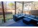 Covered patio with outdoor seating, providing a comfortable spot for relaxation and entertaining at 1620 Palm St, Canton, GA 30115