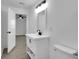 Clean bathroom, featuring a white vanity and updated fixtures at 1318 Graymont Sw Dr, Atlanta, GA 30310