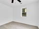 Well-lit bedroom, featuring a ceiling fan and hardwood floors at 1318 Graymont Sw Dr, Atlanta, GA 30310