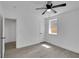 Bright bedroom with ceiling fan and hardwood floors at 1318 Graymont Sw Dr, Atlanta, GA 30310