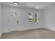 Spacious living room with gray flooring and neutral walls at 1318 Graymont Sw Dr, Atlanta, GA 30310