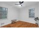 Bright bedroom with hardwood floors and window at 1386 Sandy Ln, Decatur, GA 30032