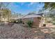 Back exterior of brick home with mature trees at 1405 Pinehurst Sw Dr, Atlanta, GA 30311