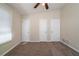 Neutral bedroom features three doors, and a window with natural light at 16 Bromack Se Dr, Atlanta, GA 30315