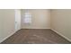 Bedroom features a window, neutral paint, and carpeting at 16 Bromack Se Dr, Atlanta, GA 30315