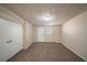 Cozy bedroom with a window, carpeting, and neutral paint at 16 Bromack Se Dr, Atlanta, GA 30315