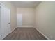 Bedroom featuring carpeting, neutral paint, and a closet at 16 Bromack Se Dr, Atlanta, GA 30315