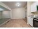 Open living room featuring vinyl floors and neutral walls for versatile styling at 16 Bromack Se Dr, Atlanta, GA 30315