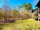 Spacious backyard with a wooden deck and screened-in porch at 25 Quail Run, Decatur, GA 30035