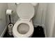 Clean bathroom with toilet and toilet paper holder at 25 Quail Run, Decatur, GA 30035