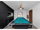 Fun game room with a pool table and dark accent wall at 25 Quail Run, Decatur, GA 30035