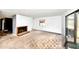 Bright living room featuring a cozy fireplace and carpet flooring at 25 Quail Run, Decatur, GA 30035