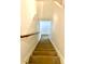 Carpeted stairs leading to the lower level at 25 Quail Run, Decatur, GA 30035