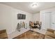 Finished basement featuring a sitting area and dining table at 2637 Cedar Dr, Lawrenceville, GA 30043