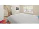 Spacious bedroom with a large bed and window at 2637 Cedar Dr, Lawrenceville, GA 30043