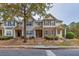 Townhome exteriors with individual entrances and symmetrical window design at 2637 Cedar Dr, Lawrenceville, GA 30043