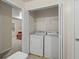 Convenient laundry closet with washer and dryer at 2637 Cedar Dr, Lawrenceville, GA 30043