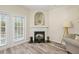 Inviting living room showcasing a fireplace, neutral walls, and modern flooring at 2637 Cedar Dr, Lawrenceville, GA 30043