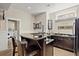 Entertain in style with this stunning bar featuring granite counters and sink at 105 Weatherford Pl, Roswell, GA 30075