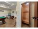 Relax and unwind in this finished basement featuring a pool table and dry sauna at 105 Weatherford Pl, Roswell, GA 30075