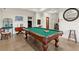 Spacious finished basement features a pool table and ample room for relaxation at 105 Weatherford Pl, Roswell, GA 30075