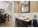 Bathroom features a stylish vanity, modern fixtures, and ample lighting, creating a comfortable and elegant space at 105 Weatherford Pl, Roswell, GA 30075