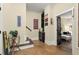 Entryway with a wine rack, stylish decor, and a view into the adjacent living space at 105 Weatherford Pl, Roswell, GA 30075