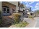 Charming home with brick accents, landscaped yard, inviting entrance, and two-car garage, creating curb appeal at 105 Weatherford Pl, Roswell, GA 30075